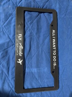 Fly Alaska Airlines Black License Plate Frame - "All I Want To Do Is..."